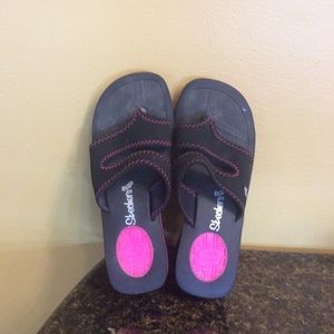 Skechers sandals.